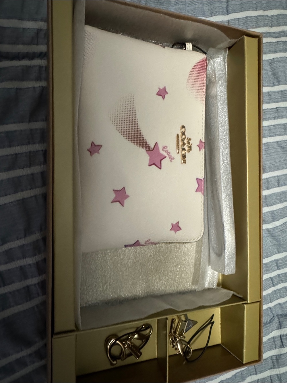 Coach White Wristlet with Pink Star Print and Gold Hardware